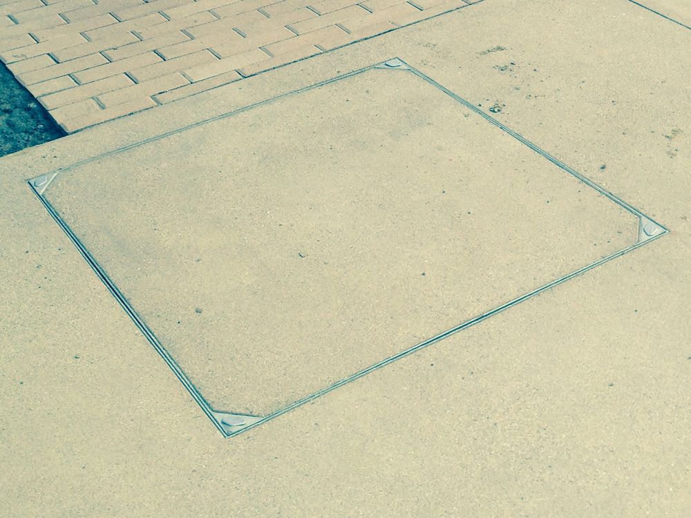 hidden manhole covers