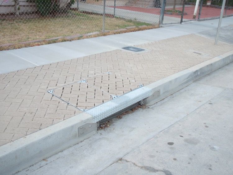 before and after hidden utility access cover